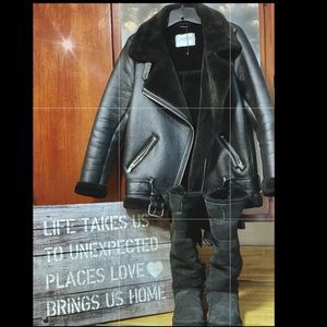 All black tall Ugg boots